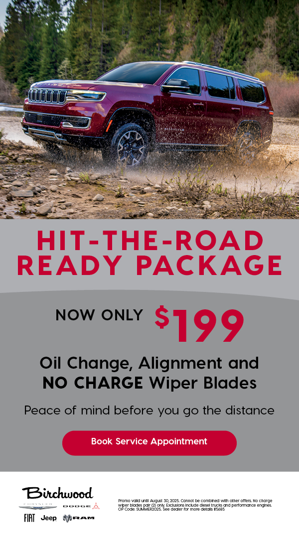 A red Jeep Wagoneer SUV splashes through a rocky stream with a forested background. Below, a banner promotes the “Hit-the-Road Ready Package” for $199, which includes an oil change, alignment, and no-charge wiper blades. Offer runs until August 30, 2025, at Birchwood Chrysler Dodge Jeep Ram.