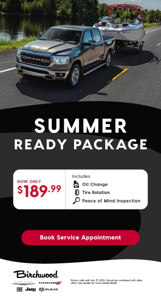 Promotional ad for Birchwood Chrysler Dodge Jeep RAM's 'Summer Ready Package' showing a RAM truck towing a boat on a scenic road. Offer includes oil change, tire rotation, and peace of mind inspection for $189.99. Features a red 'Book Service Appointment' button. Fine print notes the offer is valid until July 31, 2025, and cannot be combined with other offers.